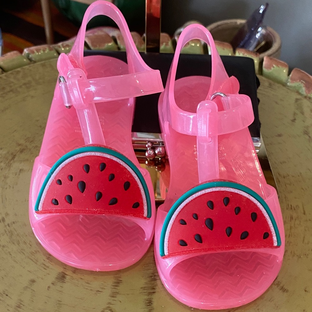 Old Navy Toddler T-Strap Jelly Shoes Sandals in pink with a watermelon accent.